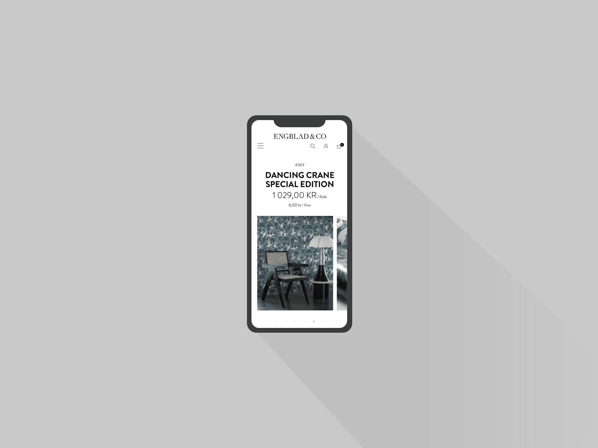 Mobiltelefon som visar upp Engblad & Cos webbplats i responsiv design